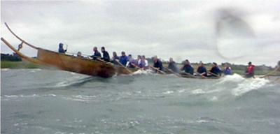 The Iron-age Hjortspring-boat taking a beating.